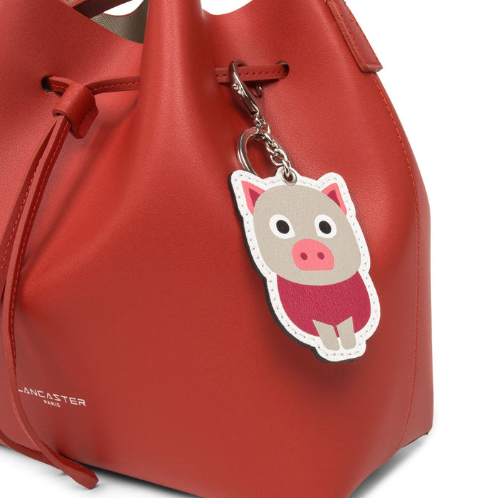 Petite maroquinerie Lancaster Bijoux de sacs Cochon COCHON