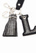 Porte cles Lollipops Kom 8229823 N0AX NOIR-ARGENTE